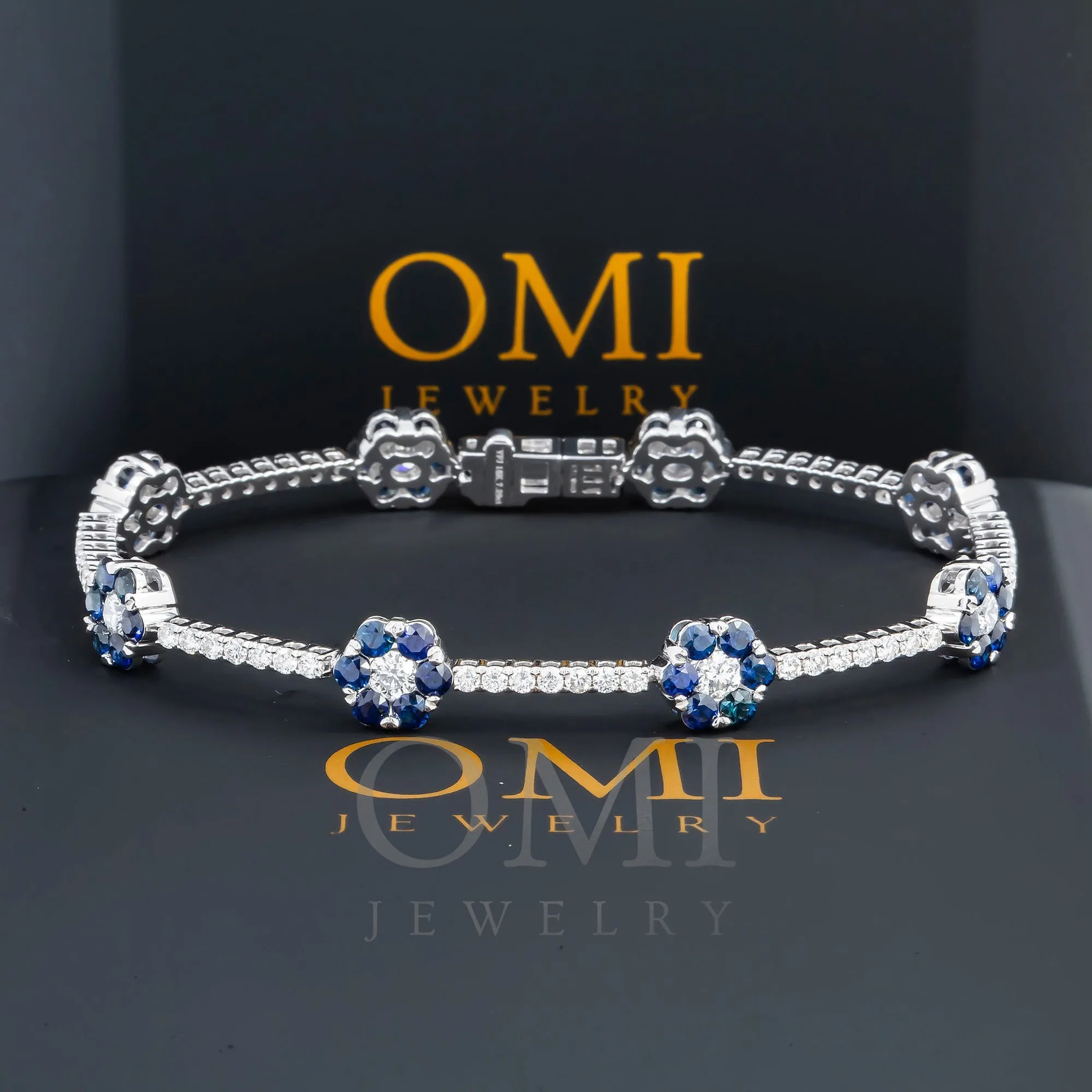 18K GOLD ROUND DIAMOND AND BLUE SAPPHIRE GEMSTONE FLOWER TENNIS BRACELET 8.03 CTW