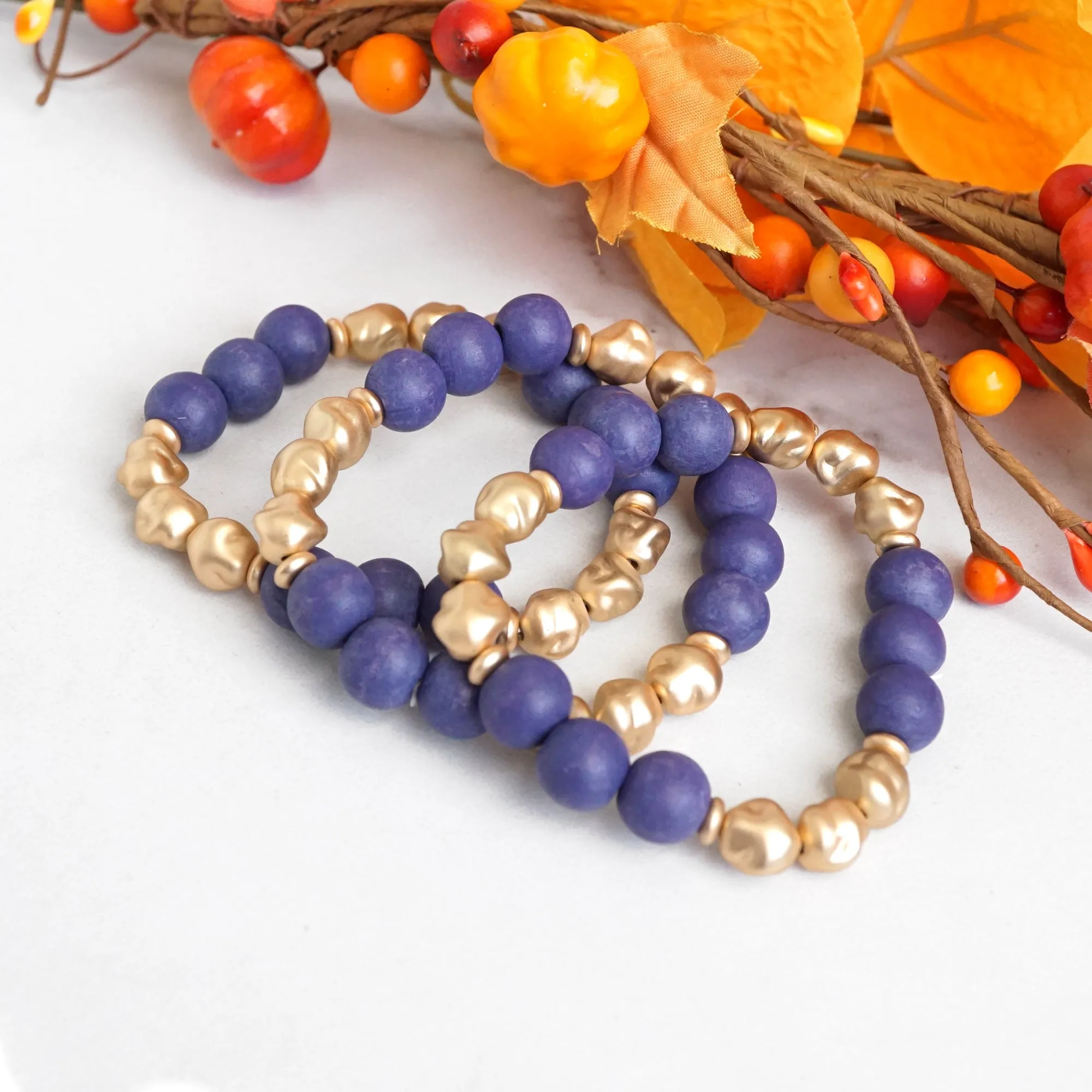 Blue Beaded bracelets stack wood and metal Gold tone beads