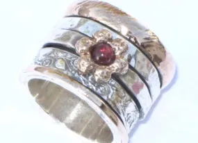 Israeli spinner rings. Floral silver gold designer jewelry Meditation ring