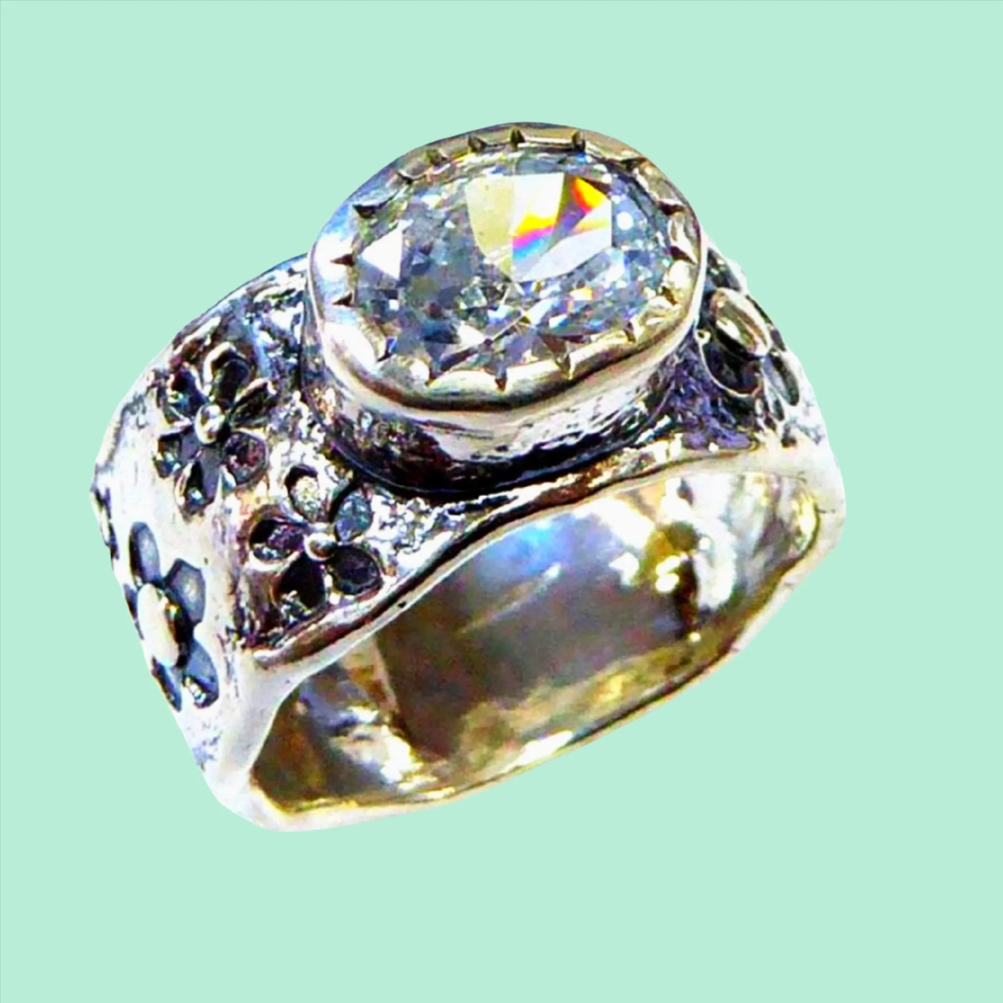 Silver sterling jewelry Israeli 925 ring for woman set with a cz zircon.